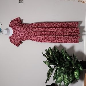 Bohemian maxi dress size medium. Has POCKETS!!!! NWOT